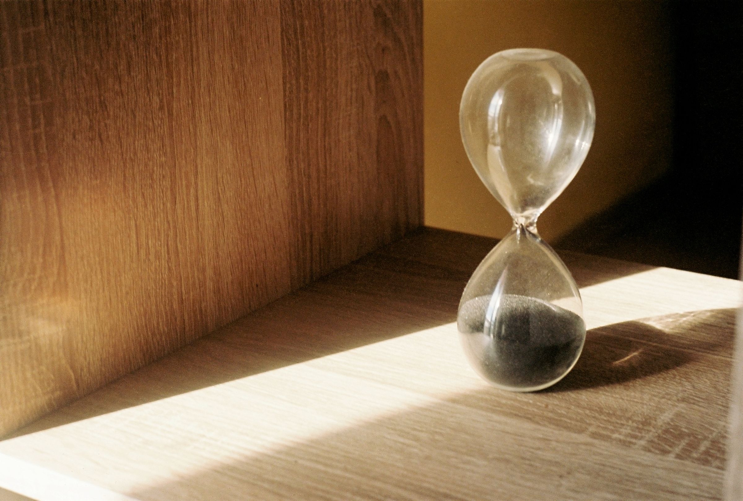 Hourglass with its sand fully run out, illustrating session timeout accessibility limits