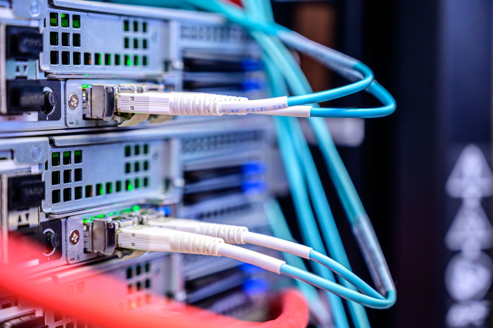 Network cables plugged into server hardware representing WooCommerce backend infrastructure