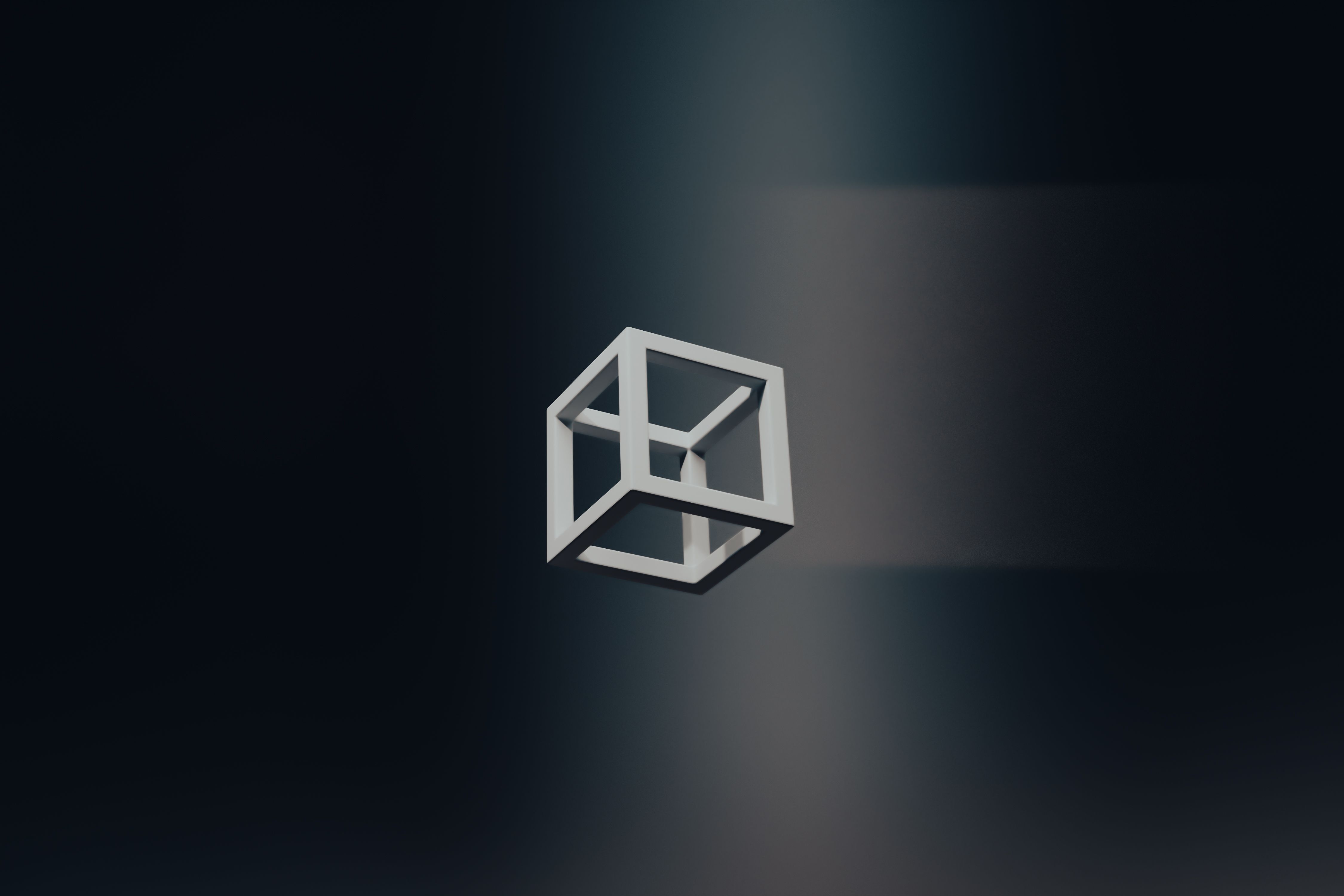 Abstract wireframe cube floating in dark space, symbolizing Google's Prompt API black box