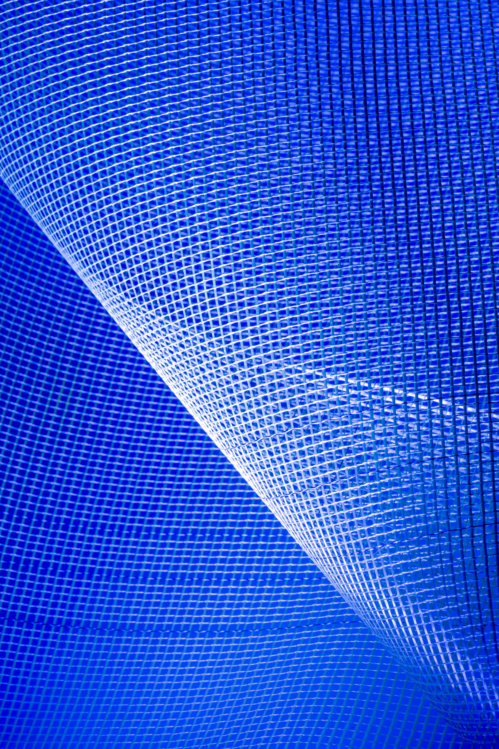 Abstract blue grid pattern representing thoughtful system tool UX design