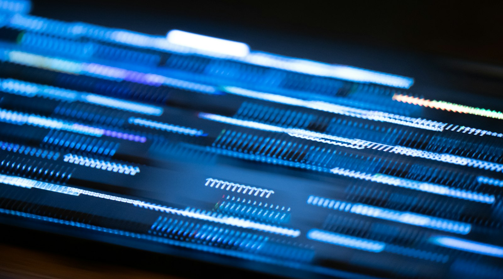 Blurred blue light streaks resembling scrolling code, symbolizing AI-generated code quality risks