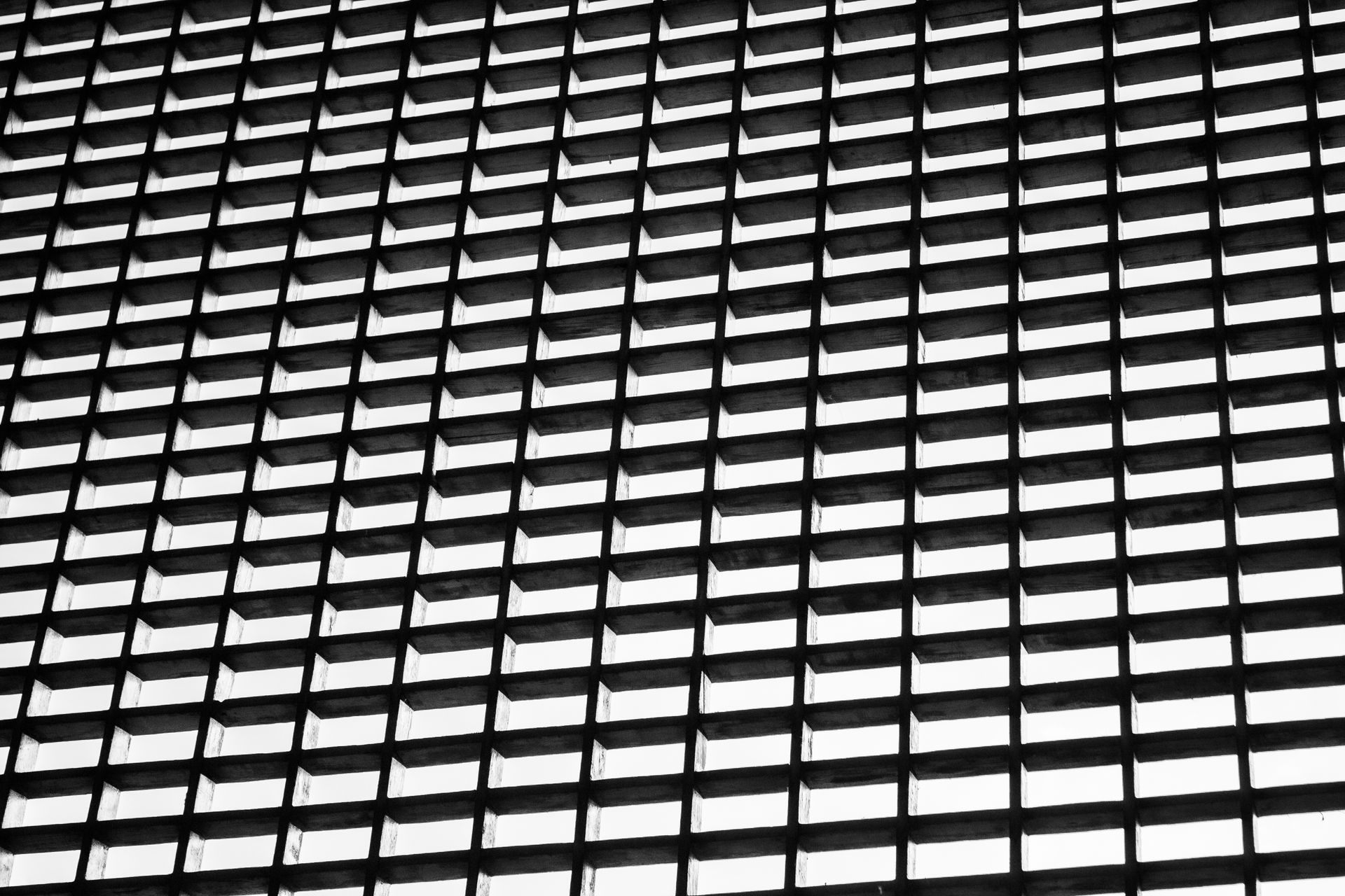Black and white grid of repeating rectangular blocks symbolizing responsive layout