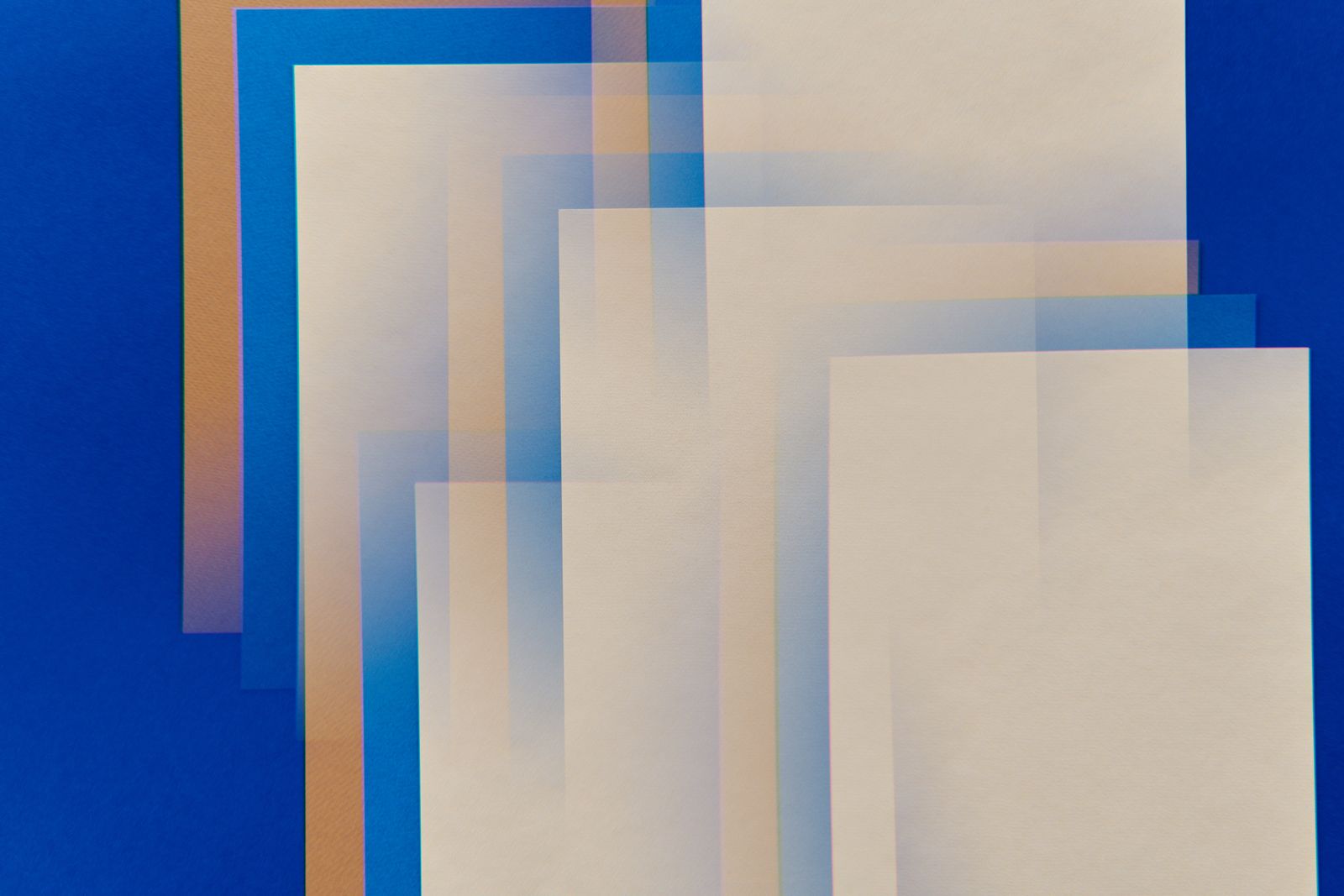 Overlapping translucent blue rectangular panels evoking a cross-document view transition morph